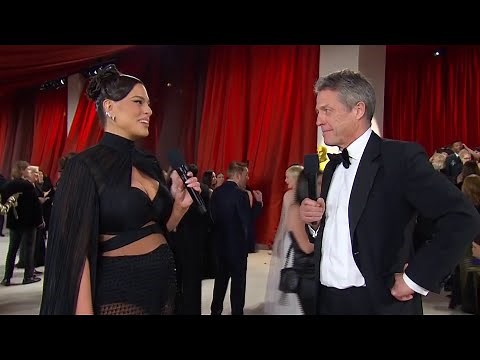 WATCH: Hugh Grant awkwardly interviewed by Ashley Graham ahead of the Oscars