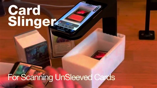 What is the Card Slinger? Update for Sept 2025 - New adjustable stand upgrade available! Fits all types of phones and works with all sorts of apps that fixed positions stands don't quite accommodate. This tool is designed to assist in scanning a large number of MTG, Pokemon, other TCG cards, sports cards and more, rapidly, by using the card scanning app of your choice on your phone. The card slinger is the first of its kind, patented device, don't accept imitations! The card slinger fits both sl