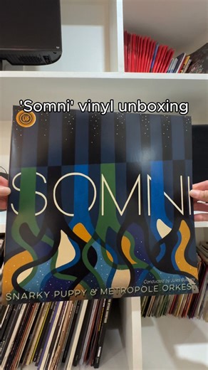 Unboxing 'Somni', a look at the limited edition blue vinyl, get yours via the link in our bio. | Snarky Puppy