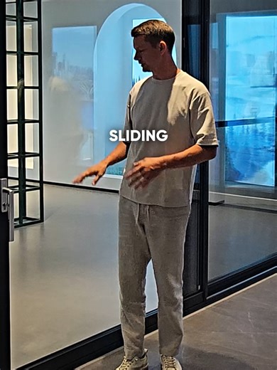 Looking for sliding windows that are quiet, smooth, and truly well-engineered? These systems lock down and sideways, pressing the frame tight for real noise reduction. Despite their large size, they glide effortlessly thanks to a precision mechanism. Drainage is built directly into the tracks, and the frame can be fully recessed into the floor — no thresholds, no interruptions. And a small but important detail: a built-in mosquito screen, so you can sleep with the windows open without unwanted g
