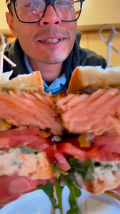 🐟✨ Get ready to vibe with my delicious salmon sandwich! Perfectly marinated with salt, pepper, Cajun spice, and garlic, then layered with a creamy spread of mayo, grain mustard, fresh parsley, and a hint of honey. Who’s ready to take a bite? 😋🥪 #salmonsandwich #flavorexplosion #foodie #recipe #healthyfood | Hashmi cuisine