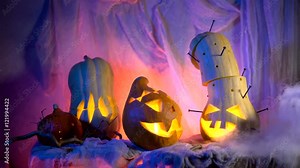 Evil pumpkin in night light glow, vapor or mist flowing around. Traditional attributes of the All Saints' Day or Halloween