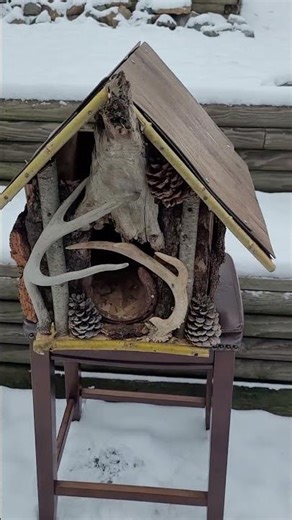 Rustic Birdhouse made with wood, bark, tree limbs, pine cones, antlers and horseshoe!!
