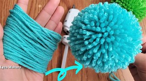 826K views · 9.1K reactions | Another idea for making a pom pom by hand with glue for crocheted hat. Instead of making 150 wraps of loops & tie it together to make a pom pom, I made three 50 wraps unfinished pom poms, glue and tie it together. I put glue on the knot. Trim the excess yarn around. I also filled with glue under and around the knot to secure. Yarn used: Medium 4 weight yarn, 100% acrylic. Happy Weekdays!!! | Lyza Hats Crochet | Facebook
