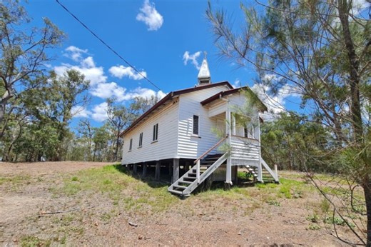 Church with no kitchen and an outhouse toilet on the market for $285,000