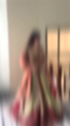 The First Date - By KIRAN on Instagram: "Meet our engagement bride Navi ❤️ She placed her order from overseas and visited us for measurements just 12 days before her engagement. What followed was pure magic. When she saw her final look, she was so stunned that she forgot to react...just stood there, quietly staring at herself in her dream outfit. Her embroidered kalidar lehenga features beautifully balanced, subtle multi -tone panels, paired with a rich copper-bronze hand embroidered blouse and 