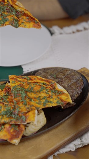 The Ma’jouqa — not just another grill dish. It’s the one that made the whole menu famous. Our best-seller, loved for its bold flavor and perfect grill. | OBBA