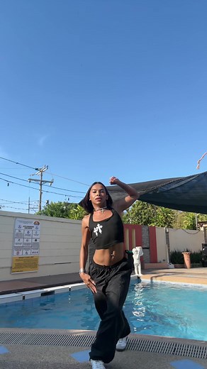 Vibrant Dance Moves by the Poolside