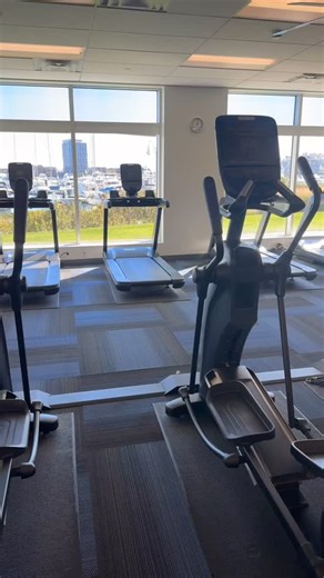 ☀️ Ocean views while you work out  Floor-to-ceiling windows, sunshine, and upgraded fitness equipment — all right here at HarborView at the Navy Yard ️‍♀️✨ Because your morning workouts deserve a view like this ⚓️ #harborviewliving #charlestownma #waterfrontviews #residentlife #luxuryliving #bostonapartmentsforrent #harborviewfitness #morningmotivation☀️ | Harborview at the Navy Yard | Facebook