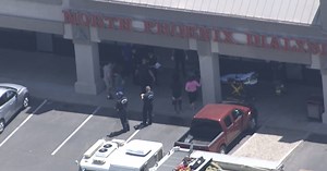 Three people hospitalized after car crashes into building near 19th and Dunlap avenues