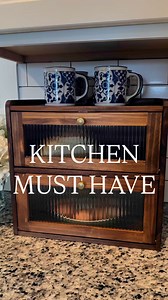This breadbox can hold so much more than bread! From unwashed farm fresh eggs, bills, coffee mugs or spices this is the perfect addition to any kitchen to add more storage! #homedecor #kitchendecor #kitchenfinds #kitchenstorage | oliveandoakhome