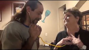 Father listens to son's heart after meeting League City woman who received it