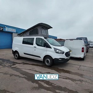 LWB Ford transit custom with a VAN-LIDZ poptop roof installed