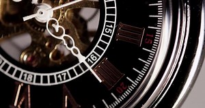 Download  Extreme close up of pocket watch with white clock hands and exposed machinery working fourty  seconds in 4K time lapse for free