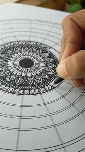 “Finding peace, one mandala at a time 🖤✨”