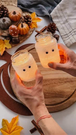 A n n i on Instagram: "Easy DIY ghost lights 👻🕯️ This easy DIY decoration will bring a cute and spooky atmosphere to your home. You’ll need: -empty jam glasses -craft glue -gauze bandages -craft eyes Prepare as seen in video and use a candle light or electric candle to let your little ghosts shine 👻🖤🕯️ !!Never leave a candle unattended!! #halloweenhacks #halloweendiy #easydiy #spookydiy #halloweendecoration #ghostcandle #ghostlight #halloweendeko #spookyseason #herbstideen #autumndecor #hal