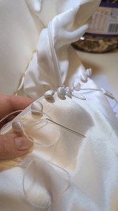 24 shares | Adding cover buttons to a wedding dress elevates its...