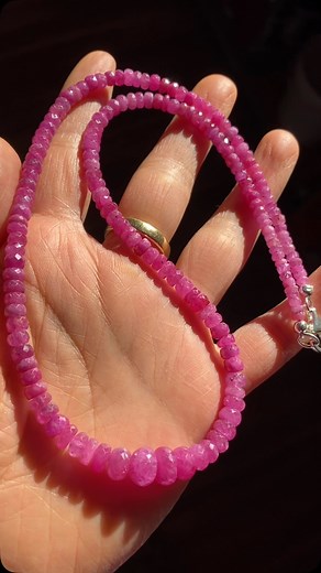 Elevate your style with this stunning pink ruby necklace, a true statement of elegance and sophistication. Crafted from 140 carats of exquisite, faceted pink ruby beads, this 48.7 cm necklace features gracefully graduated pearls ranging from 3 to 8 mm, offering a captivating blend of sparkle and natural beauty. The 925 sterling silver clasp adds a touch of refinement, ensuring both durability and a secure fit. Whether worn alone or layered, this radiant piece is perfect for adding a luxurious po