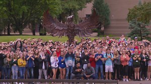 UWGB freshmen take class photo around new sculpture