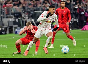 Muenchen, Deutschland. 20th Dec, 2024. GER, Bayern, Muenchen, Fussball, FC Bayern Muenchen - RB Leipzig, in der Allianz Arena, Muenchen, Bundesliga, 15. Spieltag, 20.12.24, v.l. Joshua Kimmich (FC Bayern Muenchen, 6), Benjamin Henrichs (RB Leipzig, 39), Michael Akpovie Olise (FC Bayern Muenchen, 17), Zweikampf um den Ball, Angriff, Foul, Schmerzen DFL/DFB regulations prohibit any use of photographs as image sequences and or quasi-video, Credit: dpa/Alamy Live News Stock Photo - Alamy