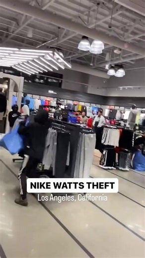 Theft caught on video at NIKE WATTS store in Los Angeles, California this past Sunday. 9801 S Alameda Street. A group of shoplifters can be seen running out with bags full of merchandise. #LosAngelesCulture #LACulture #LosAngeles #socal #LATiktok