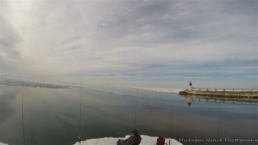 Fishing off the St. Joseph Pier on Lake Michigan. 📍 St. Joseph, Michigan #michigannativephotography | Michigan Native Photography