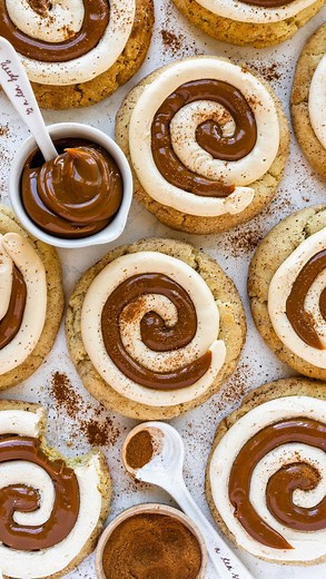 Dulce de Leche crumbl cookies!!! They are soft and delicious! The cookie base is made with sweetened condensed milk and I swear by this recipe! It makes the most scrumptious cookie ever! It’s perfectly chewy and soft!!! The cookies are topped with dulce de leche and dulce de leche frosting swirl Recipe on my website #crumbl #dulcedeleche #cookies #christmascookies #christmasbaking | Pies and Tacos