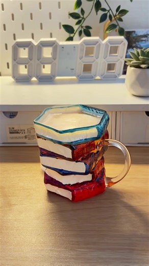 A creative glass mug shaped like stacked books — a fun pick for readers, writers, and cozy coffee moments. ☕📖 🔍 Find it at https://temu.to/m/gzyev6vfu27 or with this code vjx97778. #temu #giftideas | Temu