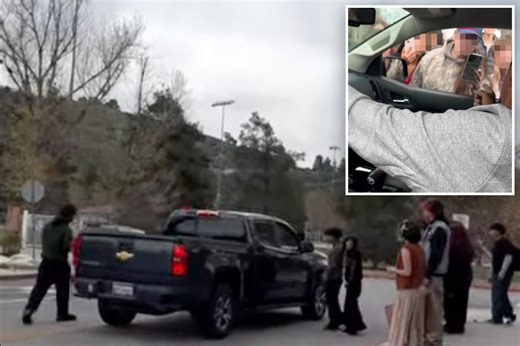 Moment high school anti-ICE protesters flee as man says he’ll “shoot them in the face”