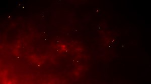 Download Flying Fire Particles Over Black And Dark Red Background. Fire Particles Background. for free
