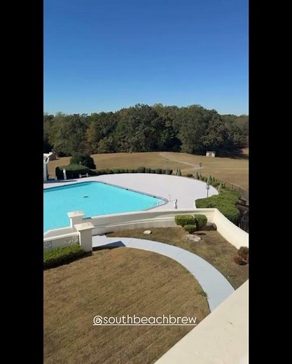 Rick Ross showcase his largest pool in America