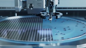 Semiconductor Packaging Process. Close-up of Silicon Die are being Extracted from Semiconductor Wafer and Attached to Substrate by Pick and Place Machine. Computer Chip Manufacturing at Fab.