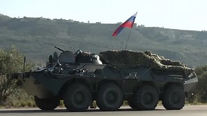Russian military base in Syria bustling as forces pull back