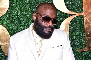 Rick Ross Displays Amusing Form During Pool Dive