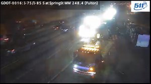 Overturned tractor trailer causes delays on Downtown Connector, police say