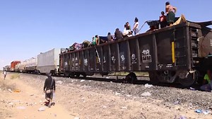 Migrants on Mexico cargo trains stuck miles from U.S. border
