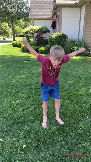 Little kid does a crazy backflip!