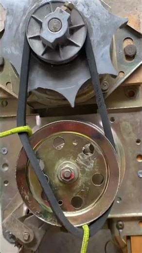 This is one way to insert rubber into the grinder using a rope.