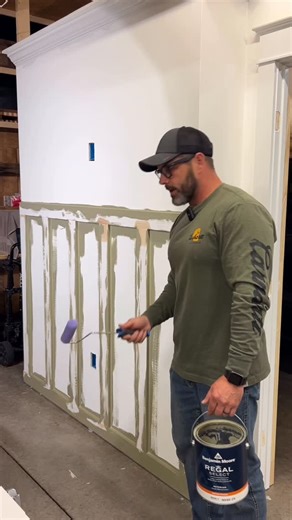 Justin Metzler on Instagram: "First coat of paint on the wainscot. I think maybe I could’ve done all of this with the 4” roller. Maybe? But using the brush in the corners was no big deal. Second coat tomorrow. Then just cut in the wall above and we’re all painted up. Color is Creekside Green, by Benjamin Moore"
