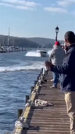 Daily Glow on Instagram: "Speeding Boat Crashes Inside No-Wake Marina Zone Annapolis, Maryland — A bystander records a powerboat racing through a marina basin where posted no-wake rules are in effect, sending a wide spray of water toward docks and nearby vessels. As the boat continues at speed, onlookers standing along the pier watch as it struggles to slow in the confined waterway, cutting across the marina toward other traffic. The boat ultimately collides with another vessel near the docks, j