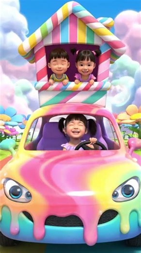 “Cutest Summer Ride Ever: Toddlers Cruising in a Rainbow Popsicle Car With a Beach Hut on Top!”