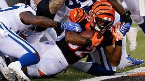 Mark Walton pushes through the pile to tally 1-yard TD