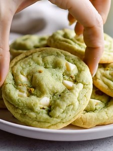 Pistachio Cookies Ingredients: - 1/2 cup unsalted butter, softened - 3/4 cup granulated sugar - 1 teaspoon clear vanilla extract - 1 egg - 1 box (3.4 oz) instant pistachio pudding mix - 1/2 teaspoon baking soda - 1/2 teaspoon salt - 1 1/4 cups all-purpose flour - 1 cup white chocolate chips Directions: 1. Preheat oven to 350°F (175°C) and line a baking sheet with parchment paper. 2. In a large bowl, cream together the softened butter and granulated sugar until light and fluffy. 3. Beat in the eg