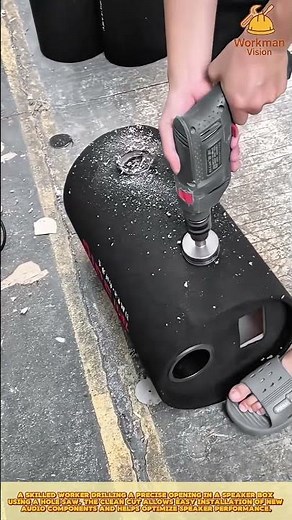 Speaker Box Modification Process: Skilled worker drilling hole for new audio component