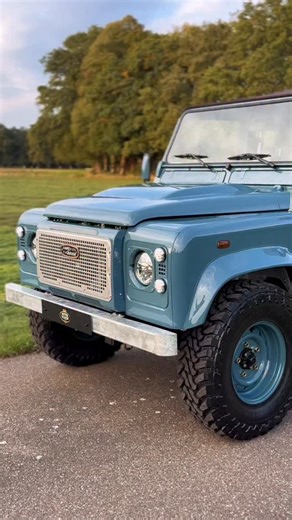 RiverHouse Landrover on Instagram: "1997 Land Rover Defender 90 300TDI Soft Top – Heritage Blue Frame-off restoration, stripped to bare chassis and finished with triple HD coating. ✨ Key Features: Chocolate brown mohair soft top + full chocolate leather & Alcantara interior Custom teakwood floors front & rear Galvanised cappings + HD internal cage for durability Fully rebuilt 300TDI engine + R380 5-speed manual Powder-coated suspension + new hardware LED lighting all around, including OEM Autobi
