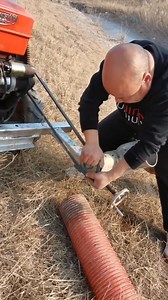 Pumping Water from Pond Using Tractor Motor #WaterPumping #IrrigationSystem #FarmTech #TractorUse #WaterManagement | Gadget Hive