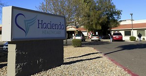 Parents of Arizona woman in vegetative state who gave birth say she's 'not in a coma'