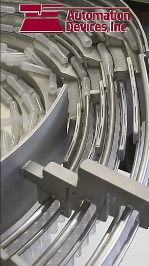 Plastic Vial Orientation in a Vibratory Feeder Bowl