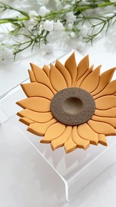 ✨ Free ✨ Mustard Color Recipe 👇🏻🌻 - 4 parts Sculpey Soufflé Yellow Ochre - 1 part Sculpey Soufflé Cinnamon 🫶 The inner circle is Sculpey Soufflé Cowboy It was about time I showed ya this trinket dish cutter in action! I think it’s gorgeous 💕🌻 Items used: • Sunflower Trinket Dish • Basic Circle 30mm • Sanding Texture Roller • Large Ball Tools The ceramic dish I used to shape the clay is oven-safe and linked in our Amazon Storefront 🙌 . . . #trinketdish #trinketdishes #polymerclay #polymerc