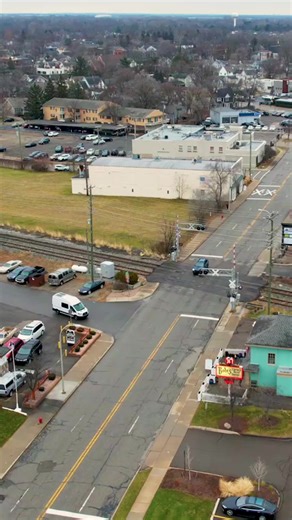 Have you had to wait for a train? This timelapse shows a slow moving CSX I151 rolling south through the Main Street crossing in Plymouth. #reels #reelsfb #timelapse #drone #asmr #train #railway #railroad #cars #traffic | Craig Hensley Photography
